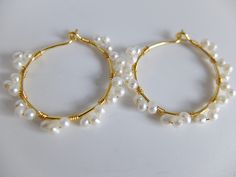 These beautiful fine hoop earrings have beautiful 2 mm freshwater creamy pearls The pearl have a good luster and organic shape They are wire wrapped around gold filled hoops with gold filled wire Diameter of the hoops is 3,00 cm- total diameter is 3,50 cm the pearls are 3 mm Thank you for visiting my shop and if you wish personalized jewels or wish more details, please contact me. I'll be happy to help Thanks for stopping by. See my other handcrafted precious jewels here: http://www.etsy.com/sho Gold Wire Wrapped Pearl Hoop Earrings, Handmade Pearl Yellow Gold Hoop Earrings, Handmade Yellow Gold Pearl Hoop Earrings, Handmade Yellow Gold Hoop Earrings With Pearl, Gold Wire Wrapped 14k Gold-filled Pearl Earrings, Gold Wire Wrapped Pearl Earrings In 14k Gold, Gold Wire Wrapped 14k Gold Filled Pearl Earrings, Pearl Hoop Earrings Wire Wrapped For Gift, Pearl Wire-wrapped Hoop Earrings As Gift