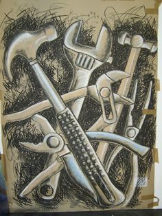 a drawing of tools and wrenches on a piece of cardboard