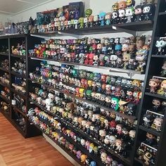 a room filled with lots of different kinds of toys on shelves next to each other