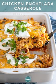 a white casserole dish filled with mexican food