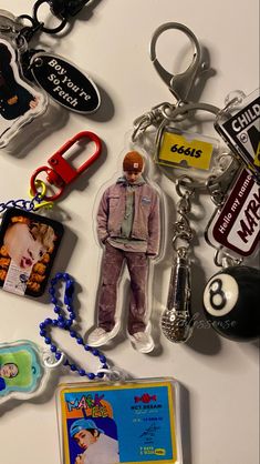 a collection of key chains with various items attached to them