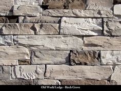 a stone wall made out of different types of rocks