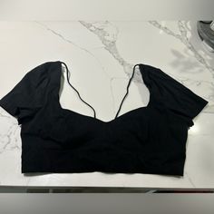 Zara Crop Top, Short Sleeve Black, Clasping In The Back Fitted Black Padded Crop Top, Black Short Sleeve Crop Top For Evening, Black Stretch Crop Top Blouse, Black Padded Blouse Crop Top, Black Fitted Crop Top Blouse, Fitted Black Crop Top Blouse, Black V-neck Padded Blouse, Black Zara Crop Top For Evening, Zara Black Stretch Crop Top