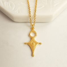 Inspired by the talismans and amulets of the tuareg this symbolic necklace represent heaven, earth and the four cardinal points.  Similar to the Egyptian ankh it empowers the wearer with wealth, protection, happiness and a long life. This necklace is small and subtle enough for everyday wear and to carry a little bit of luck and magic wherever you go. Perfect as a treat for yourself or a gift for a loved one. Anyone who needs some magical positive energy.  Every order comes in beautiful packagin Necklace Women Gold, Dnd Things, Cardinal Points, Egyptian Ankh, Festival Necklace, Minimalist Necklace Gold, Amulet Charm, Talisman Pendant, Talisman Necklace