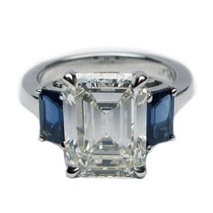 4.93 Carat Emerald Cut Diamond Blue Sapphire Ring | From a unique collection of vintage engagement rings at https://www.1stdibs.com/jewelry/rings/engagement-rings/ Luxury Modern Emerald-cut Sapphire Ring, Luxury Emerald-cut Sapphire Ring For Women, Blue Emerald-cut Ring In Fine Jewelry Style, Luxury Hallmarked Emerald-cut Sapphire Ring, Exquisite Emerald-cut Sapphire Ring, Big Diamonds, Rings Sapphire, Tiffany Diamond, Emerald Cut Diamond Ring