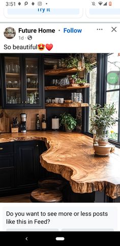 an image of a kitchen counter top made out of live edge wood and surrounded by black cabinets