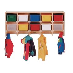 a wooden coat rack filled with lots of colorful bins