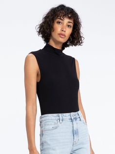 Details Add this essential to your cold-weather rotation. The mock neck adds a bit of cover while the sleeveless body is great for layering without all the bulk. Mock Neckline Size + Fit Model is 59, B 32, W 23, H 36 1/2 and wearing size S Front Length: 23 1/2 inches Back Length: 23 1/2 inches Fabric + Care Fabric Content: 94% Rayon 6% Spandex Care: Hand Wash Cold, Lay Flat to Dry Import Sleeveless Mock Neck, Mock Neck Tank, Mock Neck Top, Mock Neckline, Shopping Day, Sale Event, Lay Flat, Basic Tank Top, Cold Weather