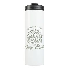 a white travel mug with the colorado 2013 camper block logo on it's side