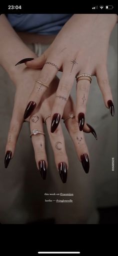 two hands with different designs on them, one is black and the other is red