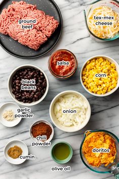 the ingredients to make mexican meatballs laid out on a marble counter top with text