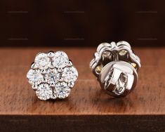 Celebrate love with our stunning flower cluster bridal Moissanite stud earrings, the perfect gift for a bride. Featuring a captivating cluster of Moissanite stones arranged in a floral design, these earrings are a symbol of everlasting love and devotion. Crafted with care and attention to detail, they make a meaningful and unforgettable gift for a special occasion. Order now and make the bride's day even more magical! ♦ NOTE: If you want PUSHBACK on earrings, please write them in the note when y Luxury Cluster Wedding Earrings, Luxury Cluster Earrings With Flower Shape For Anniversary, Diamond White Flower Shaped Earrings For Wedding, Diamond White Flower-shaped Earrings For Wedding, Luxury Flower Shaped Cluster Earrings For Anniversary, Luxury Cluster Earrings For Wedding, Luxury Cluster Flower-shaped Earrings For Anniversary, Luxury Flower-shaped Cluster Earrings For Anniversary, Luxury Flower Shaped Diamond Wedding Earrings