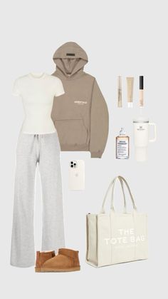 the contents of a woman's outfit including a hoodie, bag and shoes