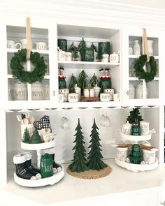 the shelves are decorated with christmas decorations