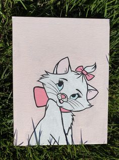 a painting of a cat with a bow on it's head sitting in the grass