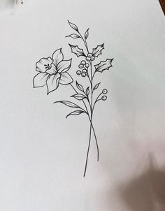 a drawing of some flowers on a piece of paper