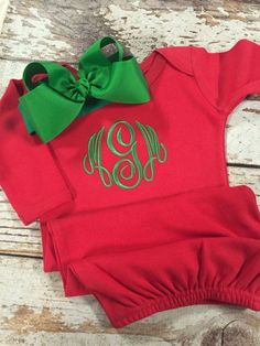 This red gown is perfect for your little one for all of your festive Christmas festivities! Sizes 0-3 or 3-6 View fonts here: https://www.etsy.com/listing/889369564/font-options-fonts-and-thread-colors-do?ref=shop_home_active_1&frs=1 Please read Shipping & Policies BEFORE placing an order. By placing an order, you are agreeing to the Policies and Procedures for SK Creations All Items are made to order & not ready to ship. Typical turnaround time for orders is 2-3 weeks. Our embroider Red And Green Outfit, Baby Christmas Pajamas, Christmas Gown, Southern Baby, Baby Coming Home Outfit, Christmas Festivities, Newborn Christmas, One For All, Christmas Monogram