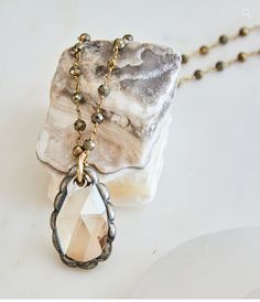 Pyrite chain with a custom Swarovski crystal pendant, about 16" long. Pyrite Pendant, Pyrite Crystal, Metallic Luster, Fool Gold, Crystal Pendant Necklace, Karen Kane, Crystal Necklace Pendant, Earrings Collection, Gold Pendant Necklace