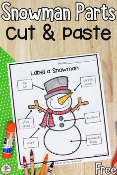 snowman parts cut and paste worksheet with crayons on the table