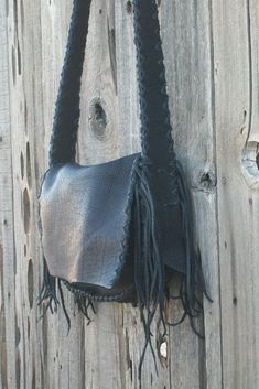 "A black leather handbag just for you ! This bag is made of soft black leather and is 9\" tall , 12\" wide and 2 3/4\" deep. This bag has an extra pocket inside and a comfortable shoulder strap. This one has a 48\" strap, let us know how long you like your shoulder strap. If you need a bag like this in a different size please contact us and we will make a custom listing for you. We can work with your desires. If you would like to choose a different color from the choices in the last photo just l Black Leather Flap Bag With Leather Handles, Black Leather Shoulder Satchel, Black Leather Shoulder Bag Satchel, Black Leather Satchel Shoulder Bag, Black Saddle Bag Tote With Adjustable Strap, Black Soft Leather Rectangular Saddle Bag, Black Rectangular Soft Leather Saddle Bag, Black Leather Flap Bag With Leather Lining, Black Leather Satchel Flap Bag