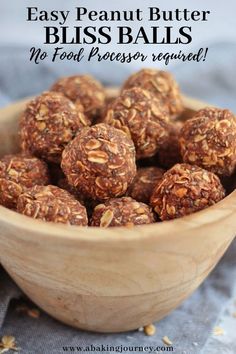 peanut butter energy balls in a wooden bowl