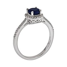 Elegant essential. Featuring a round-cut sapphire stone and diamond accents, this frame ring elevates any ensemble. Pair this sterling silver ring with a new pendant for unmatched beauty. Click on this JEWELRY & WATCHES GUIDE to learn about fit, styles, materials and more! Beaded details enhance the round frame and band. Scrollwork adorns the sides of the setting. Ring comes in a gift box. Details: 5-mm width Rhodium-plated sterling silver Image(s) may be enlarged to show detail. Diamond weights Elegant Halo Ring With Round Stone For Formal Occasions, Elegant Sapphire Halo Ring With Cubic Zirconia, Fine Jewelry Halo Ring With Prong Setting, Elegant Ring With Lab-created Sapphire Center Stone, Sapphire Rings With Diamond Accents And Round Cut, Fine Jewelry Sapphire Halo Ring For Formal Occasions, Elegant Ring With Center Stone Lab-created Sapphire, Elegant Sapphire Birthstone Ring With Brilliant Cut, Elegant Lab-created Sapphire Ring With Center Stone