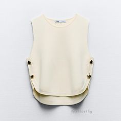 New With Tag Brand Zara Seller: @Chloethy Zara S/S 2024 Collection Basic Knit Sleeveless Vest With Round Neck. Side Gold Button Detail. Color Ecru | 9598/133 Outer Shell 62% Viscose 38% Polyamide Which Has At Least: Outer Shell 38% Rcs-Certified Recycled Polyamide Sleeveless Tops With Buttons For Fall, Chic Knit Top With Button Closure, Chic Spring Sweater Vest With Button Closure, Chic Buttoned Tank Top, Chic Fall Tank Top With Button Closure, Chic Buttoned Tank Top For Day Out, Chic White Buttoned Tank Top, Zara New Collection 2024, Chic Beige Buttoned Tops