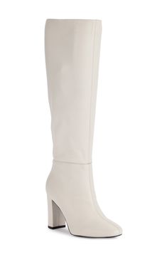 Effortlessly elevate your look with this streamlined leather boot featuring a knee-high shaft and classic block heel. 3" heel 15" shaft; 14 1/2" calf circumference Inset side-zip closure Cushioned footbed Leather upper/synthetic lining and sole Imported Long White Boots, Off White Boots, Karl Lagerfeld Paris, White Boots, Leather Boot, Elevate Your Look, Soft White, Karl Lagerfeld, Knee High Boots