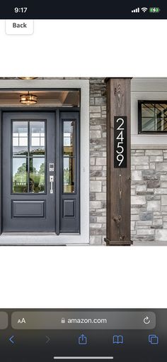 the front door to an apartment with two windows and a sign that says, enter here