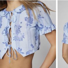 Kimchi Blue Saturday Tie Front Cropped Top Blue Floral Pattern Collared Blouse Style With Three Tie Front Bows Or Can Be Worn Untied And Open Size M But Runs Closer To A S Never Worn, New Without Tags I Adore This Shirt But I Just Can’t Figure Out A Way To Style It For Myself So Hoping It Finds A Fashion Girlie Who Really Loves It! Light Blue Summer Blouse For Vacation, Light Blue Blouse For Summer Vacation, Chic Floral Print Tops By Urban Outfitters, Fitted Blouse For Vacation By Urban Outfitters, Urban Outfitters Fitted Blouse For Vacation, Chic Urban Outfitters Floral Print Tops, Fitted Cropped Blouse For Beach, Urban Outfitters Short Sleeve Summer Blouse, Blue Feminine Tops For Daywear