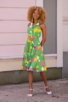 April showers bring May flowers...and these flowers are POPPING with vibrant yellow, pink, magenta and white! This 1960s Mod Tulip print is recreated in stretch rayon in to wear for spring, summer and beyond. Don't be a wallflower and pair this with bold and chunky accessories and a great platform heel! Super vintage i Spring Garden Party Dress With Retro Print, Yellow Spring Dress With Retro Print, Yellow Dress With Retro Print For Spring, Chunky Accessories, April Showers Bring May Flowers, Trashy Diva, 1960s Mod, Tulip Print, Clothing And Textile