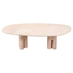 an oval marble table with three wooden legs