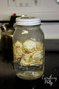 a glass jar filled with food sitting on top of a counter