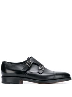 Black leather William monk shoes from John Lobb featuring silver-tone hardware, an almond toe, a buckle fastening, a branded insole, a flat sole and a low heel. Semi-formal Monk Strap Shoes With Rubber Sole, Timeless Monk Strap Shoes For Business Casual, Elegant Closed Toe Monk Strap Shoes With Tang Buckle, Classic Monk Strap Shoes With Almond Toe For Derby, Classic Business Monk Strap Shoes With Brogue Detailing, Timeless Wingtip Monk Strap Shoes With Rubber Sole, Classic Monk Strap Shoes For Business With Brogue Detailing, Timeless Monk Strap Wingtip Shoes With Rubber Sole, Classic Almond Toe Monk Strap Shoes For Derby