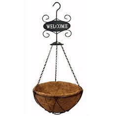 a welcome sign hanging from the side of a basket