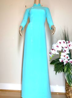 Brand New High Quality Vietnamese Chiffon Ao Dai with Pants. Fast and Free Priority shipping (1-3 days) to arrive via USPS. Size Bust/Chest Waist S 32in/81cm 27in/69cm M 33in/84cm 28in/71cm L 35in/89cm 30in/76cm XL 36in/91cm 31in/79cm 2XL 37in/94cm 32in/81cm 3XL 38in/97cm 33in/84cm 4XL 40in/102cm 35in/89cm 5XL 41in/104cm 37in/94cm 6XL 42in/107cm 38in/97cm Ao Dai Length is 56.3in/143cm Pants Length is 44.1in/112cm Please provide Bust, Waist, and Hip measurements as well as Arm Circumference when Fitted Full-length Chiffon Dress, Fitted Full Length Maxi Dress For Daywear, Fitted Full-length Maxi Dress For Daywear, Fitted Ao Dai For Formal Summer Events, Spring Stretch Ao Dai With Long Sleeves, Spring Evening Ao Dai With Long Sleeves, Fitted Full Length Ao Dai For Party, Blue Ao Dai For Spring Party, Fitted Long Ao Dai For Summer