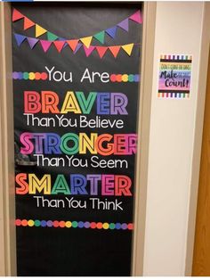 a bulletin board that says you are braver than you believe stronger than you seem smarter than you think