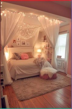 a bedroom with lights strung from the ceiling and curtains over the bed, along with a rug on the floor