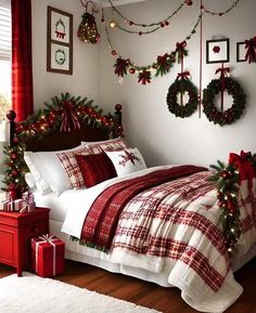 a bedroom decorated for christmas with wreaths and lights