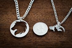 All 4 of these wolf necklaces fit together perfectly because they were cut by hand from the same piece. Its cut from a half dollar. You may also choose a silver half dollar or a real silver dollar.We have a small team of 6 people. We all work very hard to give you the perfect gift. We really do cut our coins totally by hand.This comes with four 20 inch chains. 4 Best Friends, Family Jewelry, Wolf Necklace, Family Jewellery, Wolf Pack, Us Coins, Bff Gifts, Half Dollar, Silver Dollar