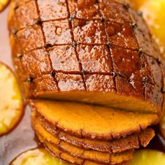 a close up of some food on a plate with lemons and other foods around it