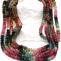 multicolored glass beaded necklace on display