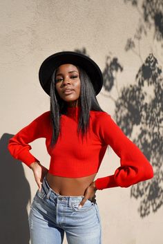 A crop knit sweater featuring a mock neckline, long sleeves, ribbed trim, and an open back. Crop Knit Sweater, Open Back Sweater, Cropped Knit Sweater, Mock Neckline, Long Sleeve Crop, Long Sleeve Crop Top, Red Green, Open Back, Knit Sweater