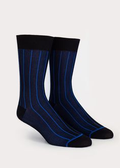 Luxe mid-calf high dress socks for men. Fabricated with the finest mercerized cotton. The Shadow Side men's dress sock features a classic two tone rib pattern, conjuring a minimal mod business vibe. Details: Size Guide One size fits most.Recommended Men's US shoe size 7 - 12, Euro 39 - 45. Materials 80% Cotton, 22% NylonMade in China Care Instructions Machine wash on perm press, no chlorine bleach,hang dry recommended. Modern Fitted Black Socks, Black Fitted Classic Socks, Fitted Black Business Socks, Formal Black Socks, Elegant Fitted Socks For Business, Shadow Side, Rib Dress, Mens Dress Socks, Socks For Men