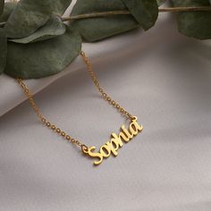 Welcome to MeiraGoldJewelry, where we create exquisite name necklaces to commemorate life's most precious moments. Our personalized name necklaces are the perfect choice for adorning your neck on occasions such as Christmas 🎄, New Year 🎉, Valentine's Day 💖, Mother's Day 🌹, Women's Day, Thanksgiving, Anniversaries 🥂, Weddings 💍, Birthdays 🎂, and more. These pieces are meticulously crafted to bring an elegant touch to your celebrations, transforming them into unforgettable memories that wil Customizable Nameplate Necklace For Personalized Gift, Customizable Pendant Name Necklace For Personalized Gift, Personalized Pendant Necklace For Gifts, Minimalist Customizable Necklace As Personalized Gift, Personalized Name Pendant Necklace As Gift, Custom Name Pendant Necklace As Personalized Gift, Personalized Pendant Necklace With Custom Name, Personalized Custom Name Pendant Necklace, Customizable Round Pendant Necklace As A Gift For Her