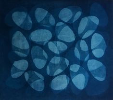 an abstract painting with blue and white circles in the center, on a dark background