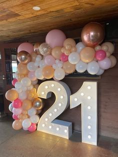 the number twenty two is surrounded by balloons