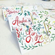 three greeting cards with floral designs on them