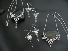 "I've designed this Irish Celtic necklace and earrings set entirely in sterling silver featuring a center, faceted 8mm gemstone that you can choose in the drop down menu! The frame, or centering, of the pendant is made with Celtic Trinity Knots and sterling wire work braids down the center to add the balancing touches to the piece. It comes with a sterling box chain which is soldered to each end of the pendant. This piece is 18\" in length, including the chain, and the pendant, itself, is approx Silver Jewelry Set With Pendant Stone Setting, Fine Jewelry Sterling Silver Jewelry Sets, Sterling Silver Fine Jewelry Sets, Fine Jewelry Silver Jewelry Sets With Stone Setting, Pendant Jewelry Sets With Stone Setting For Gifts, Pendant Jewelry Sets With Stone Setting As A Gift, Silver Sterling Jewelry For May Birthstone, Sterling Silver Jewelry Sets As A Gift, Silver Jewelry Sets With Matching Earrings As Gift