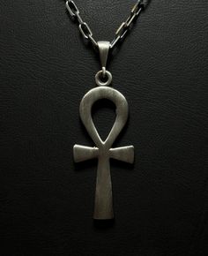 Personalized Solid Silver Solid Silver Vintage Ankh Pendant Discover elegance and significance with our Solid Silver Solid Silver Vintage Ankh Pendant, designed for both men and women. Crafted from 925 Sterling Silver, this necklace features intricate handmade details and can be personalized to add a special touch. Ideal for daily wear or as a thoughtful gift, this pendant is a beautiful way to celebrate meaningful moments. Why You'll Love It: Handcrafted Excellence: Each pendant is meticulously crafted with attention to detail. Elegant and Versatile: Complements any outfit with its sophisticated design. Customizable: Personalize with engravings for a unique touch or a memorable gift. Product Details: Material: 925 Sterling Silver Finish Options: Oxidized, Polished, Gold Plated, Rose Gold Ankh Shaped Metal Necklace As Gift, Ankh Shaped Metal Necklace For Gift, Nickel-free Ankh Necklace As Gift, Silver Ankh Gothic Necklace, Vintage Ankh Necklace In Metal, Tarnished Silver, Memorable Gifts, Unique Necklaces, Cleaning Jewelry